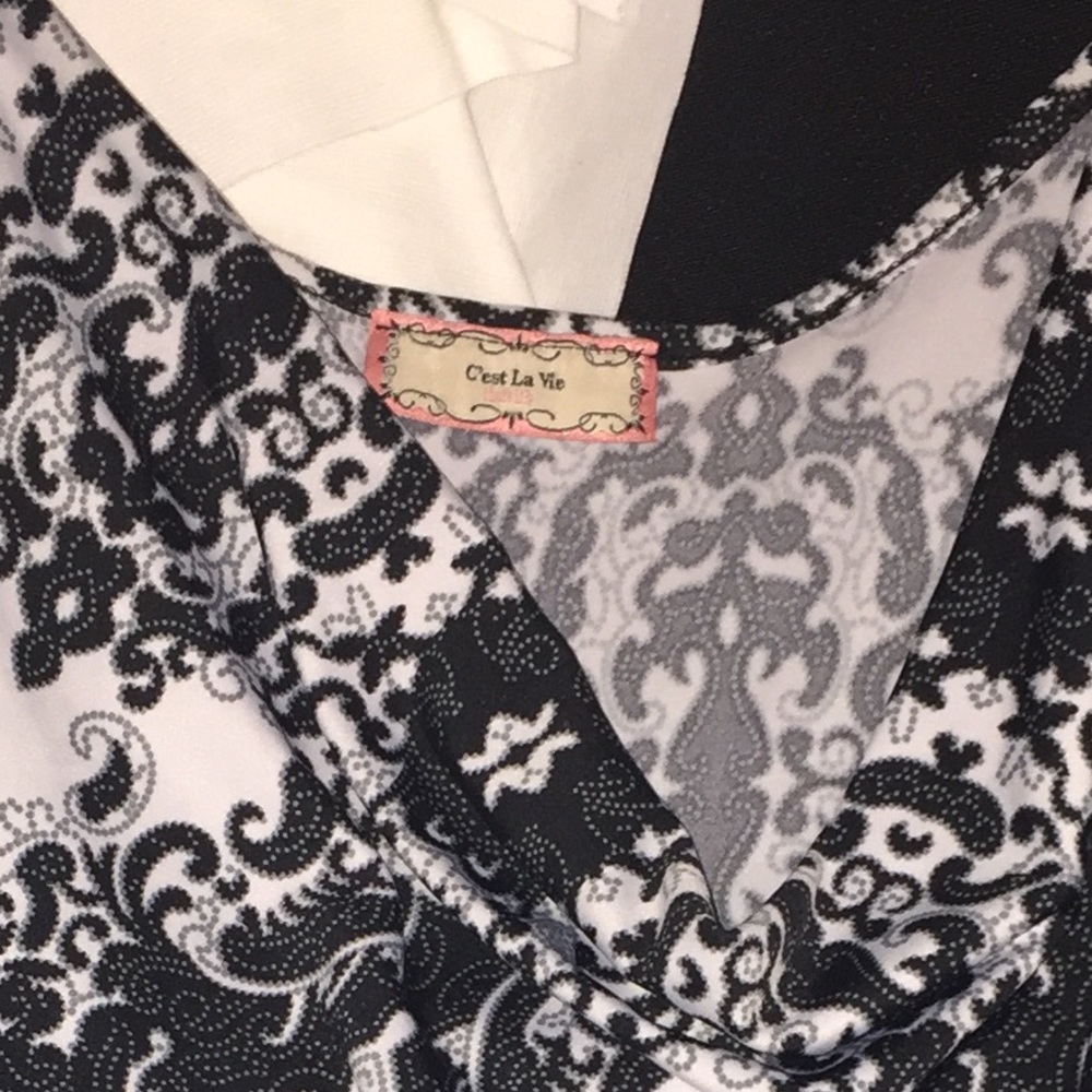 Women’s sleeveless blouse with cowl neck